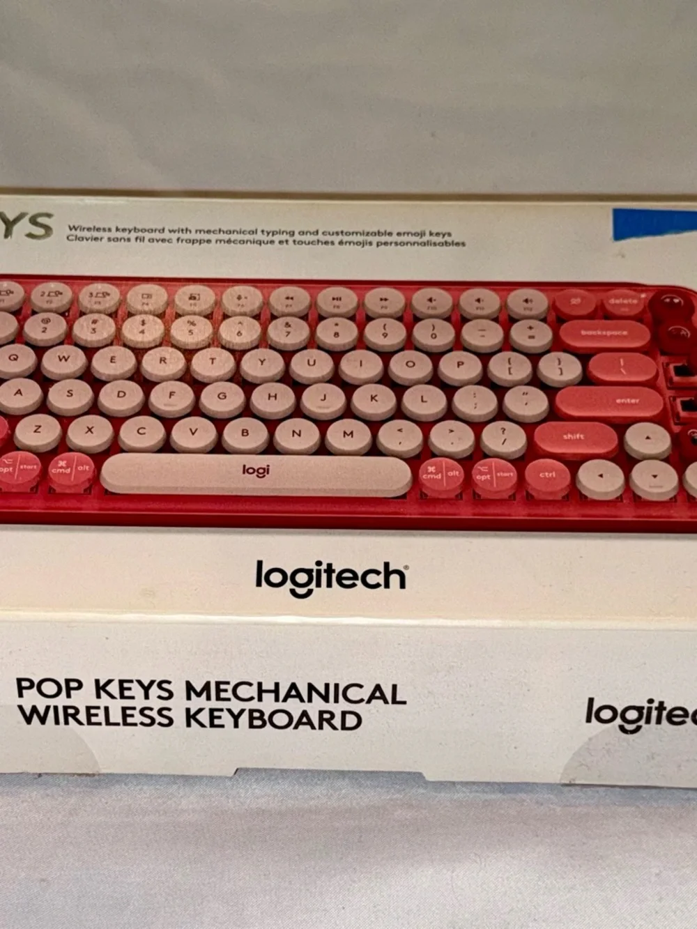 Logitech Retro Round-Key Wireless Keyboard in Red and Pink